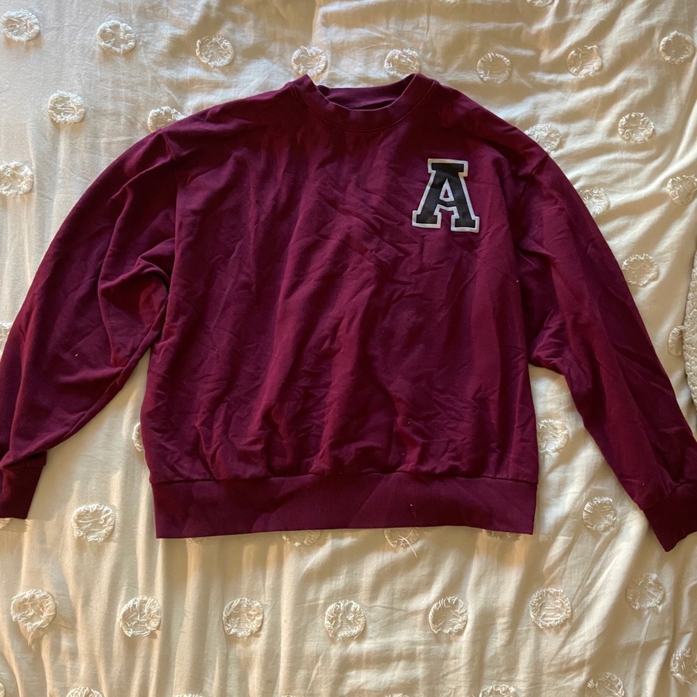 Varcity lettered, maroon sweatshirt